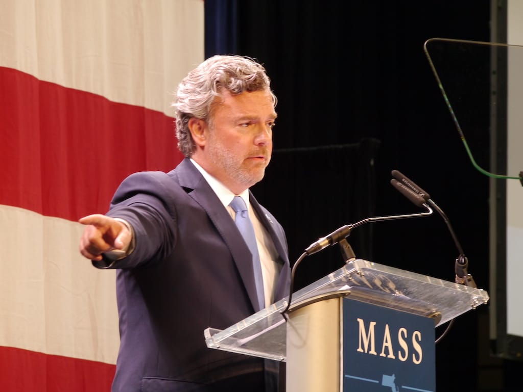 Mass Democratic Party Chairman Steve Kerrigan addresses delegates from the stage at the Mass Mutual Center in Springfield.