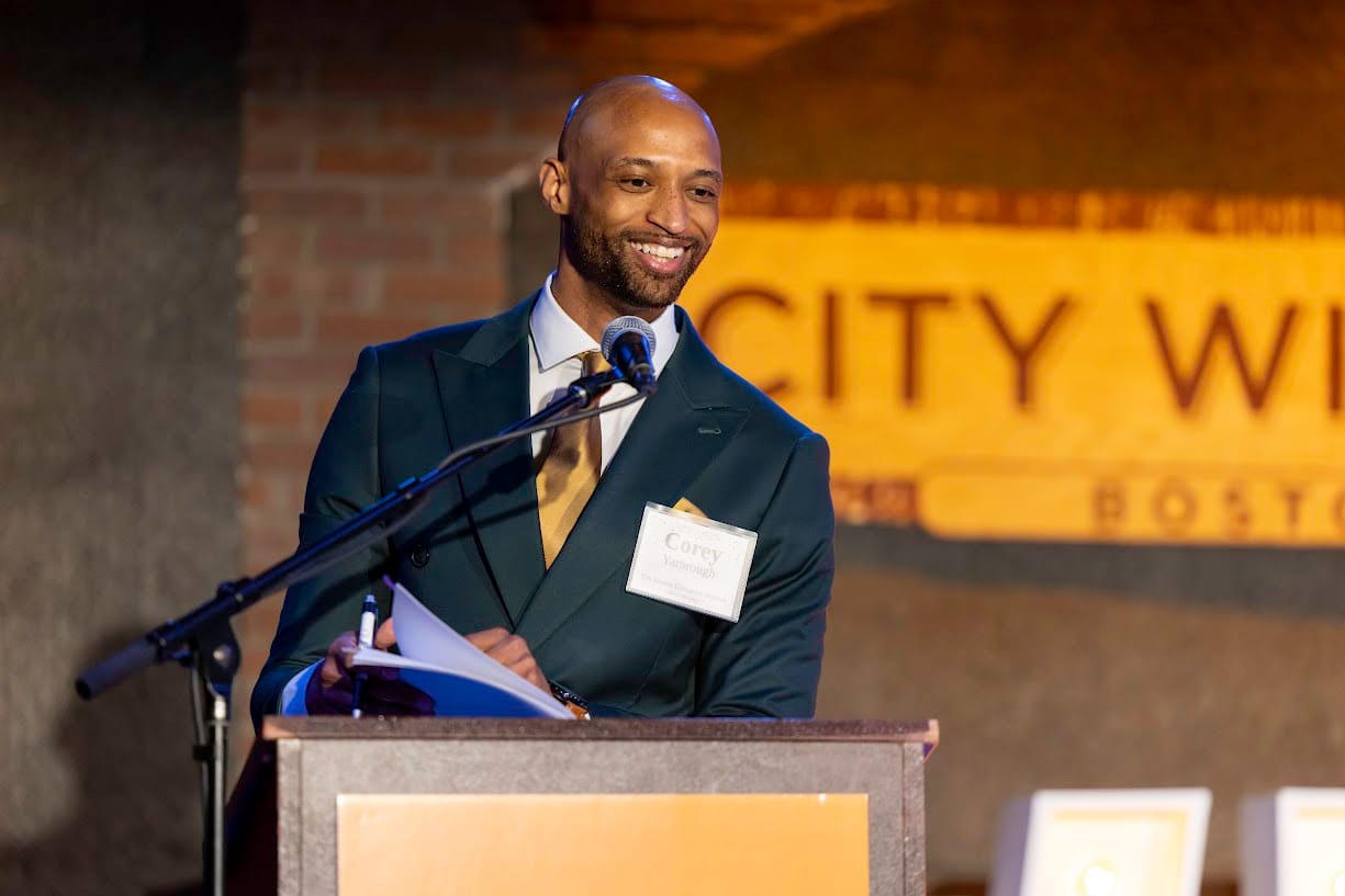 826 Boston Executive Director Corey Yarbrough speaks at a podium at City Winery.