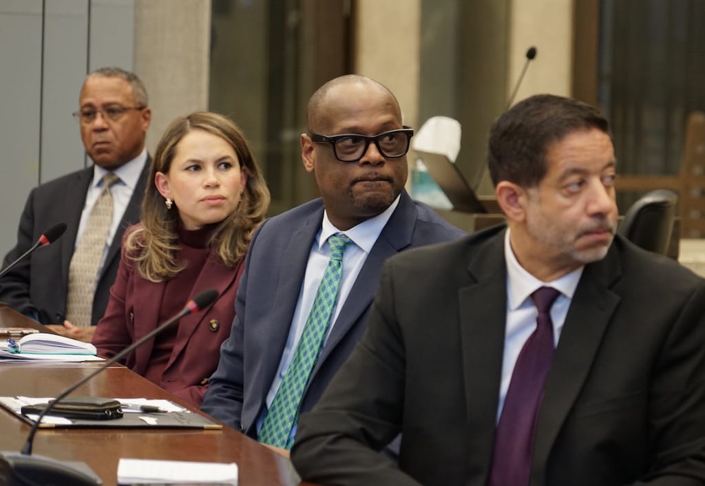 Public Facilities Department executive director Carleton Jones,&nbsp;Deputy Chief of Urban Design Diana Fernandez Bibeau, Chief of Operations Dion Irish and BPS Deputy Superintendent of Operations Samuel DePina listen to public testimony in the Iannella Chamber at City Hall.