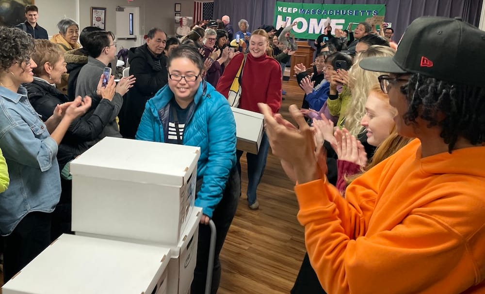 Volunteers submit signatures for rent control measure post image