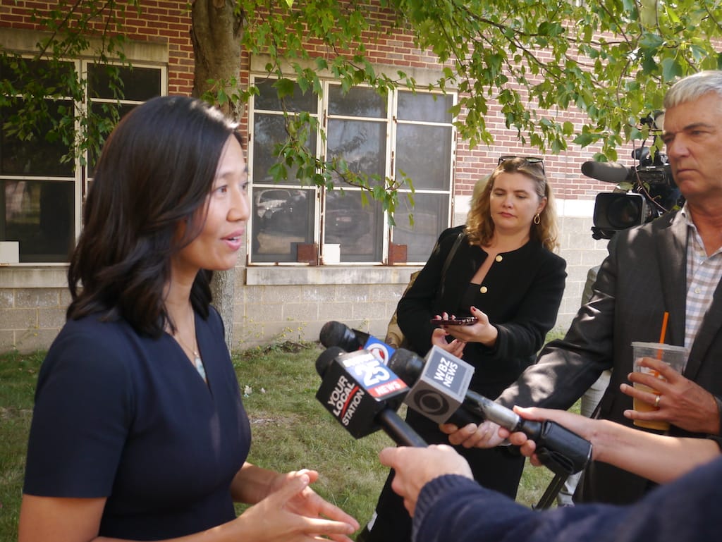 Mayor Michelle Wu speaks to reporters outside the Lila Frederick School on Columbia Road in Dorchester Tuesday