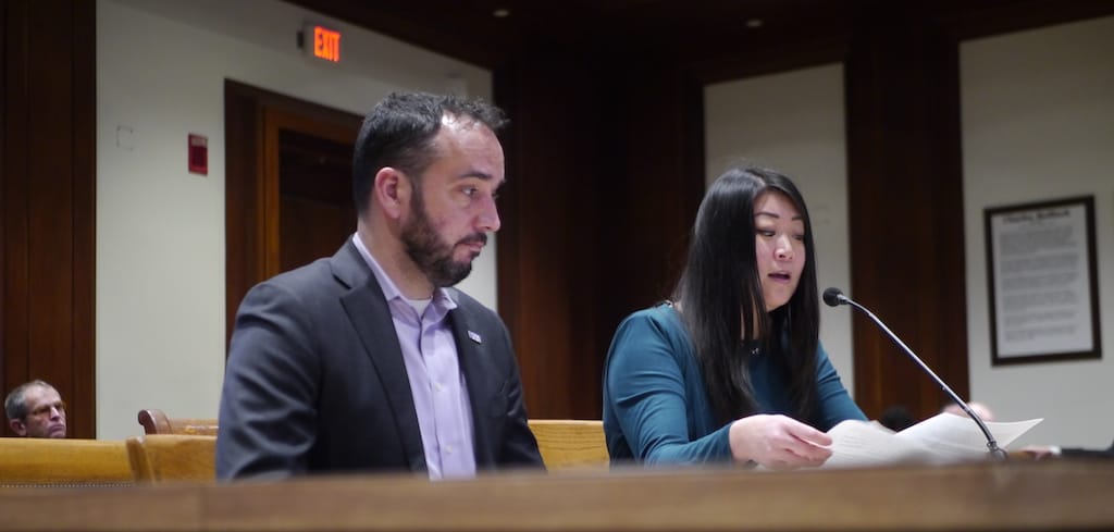 American Federation of Teachers Massachusetts President Jessica Tang reads from her testimony while appearing before lawmakers at the State House.