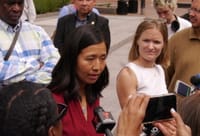 Mayor Michelle Wu speaks with reporters on City Hall Plaza August 19.