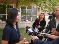 Mayor Michelle Wu speaks to reporters outside the Lila Frederick School on Columbia Road in Dorchester Tuesday