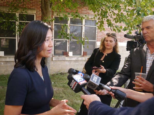 Mayor Michelle Wu speaks to reporters outside the Lila Frederick School on Columbia Road in Dorchester Tuesday